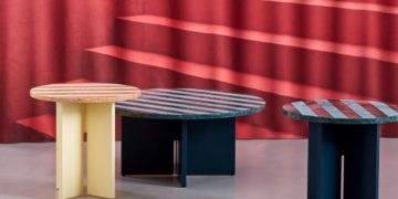 This coffee table is not what it seems, it is not cardboard but colored marble