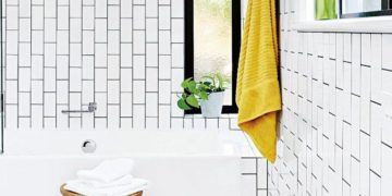 Trend in the bathroom; the tiles are also placed vertically in the bathrooms