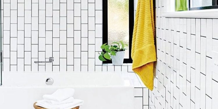 Trend in the bathroom; the tiles are also placed vertically in the bathrooms