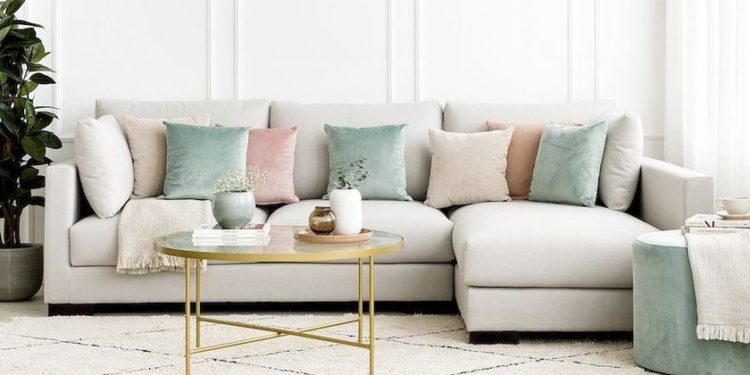 Plaids, blankets and cushions with which to renovate and update the living room