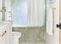 Trend alert; the latest in bathroom coverings are colored marble and onyx