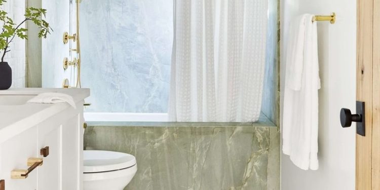 Trend alert; the latest in bathroom coverings are colored marble and onyx
