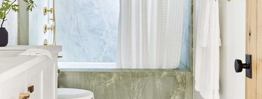 Trend alert;  the latest in bathroom wall tiles are colored marbles and onyx 