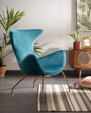 Turquoise velvet armchair