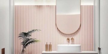 Trend in the bathroom;  reliefs and vertical lines on the tiles that energize and add a new element to the bathroom