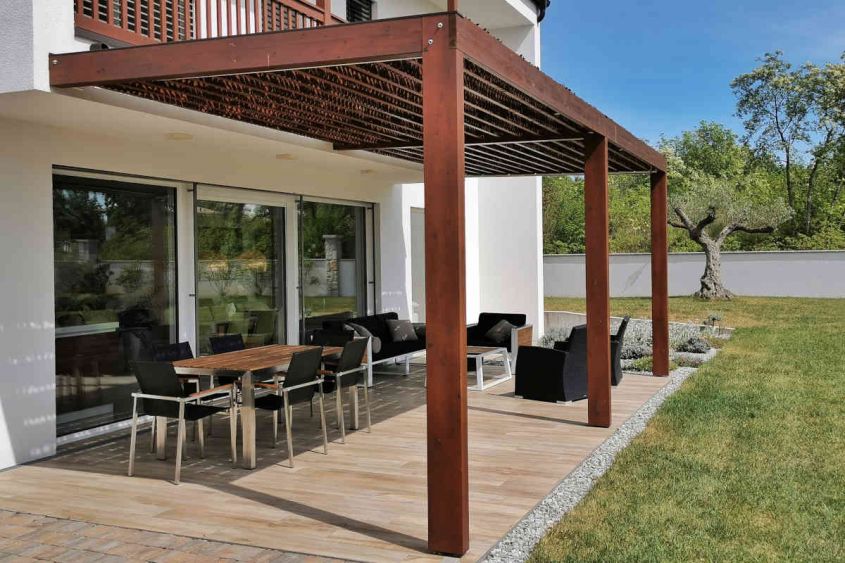 leaning wooden pergola