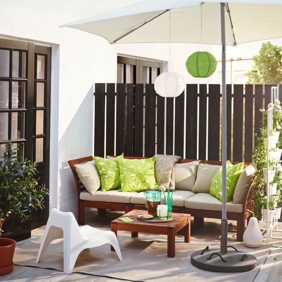 uncovered terrace furnished with umbrella