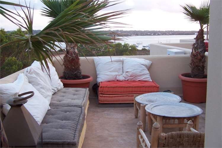 uncovered terrace furnished with benches