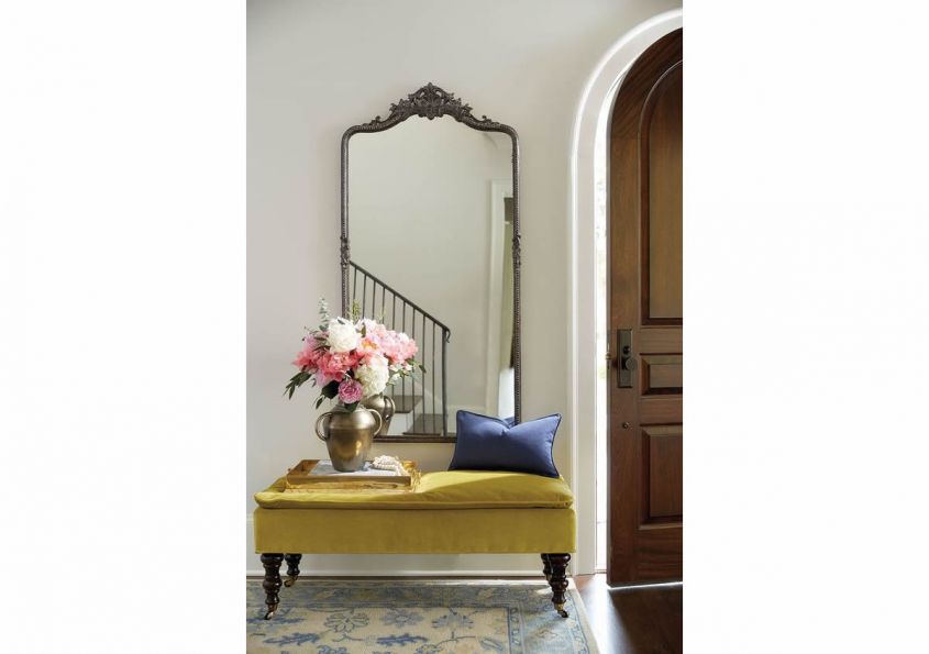 antique mirror and armchair