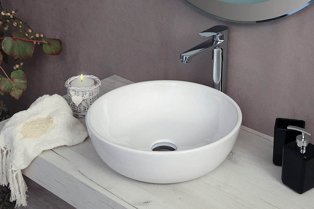 Resin or ceramic bathroom sink: pros and cons