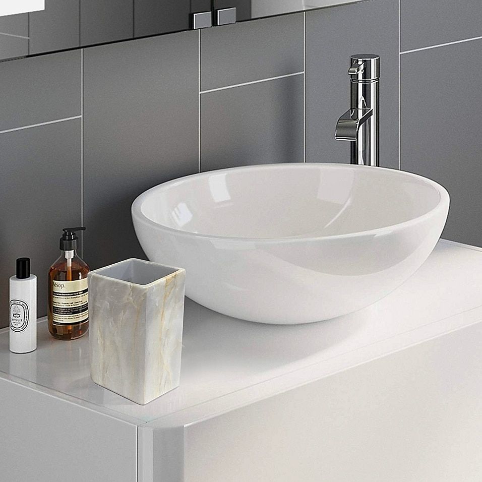 Resin or ceramic bathroom sink: pros and cons