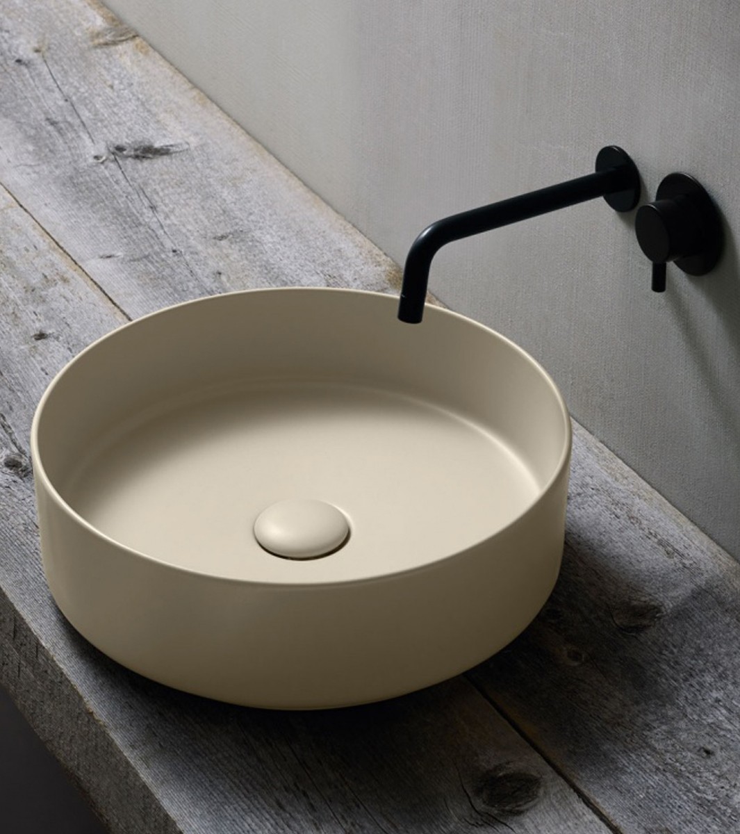 Resin or ceramic bathroom sink: pros and cons