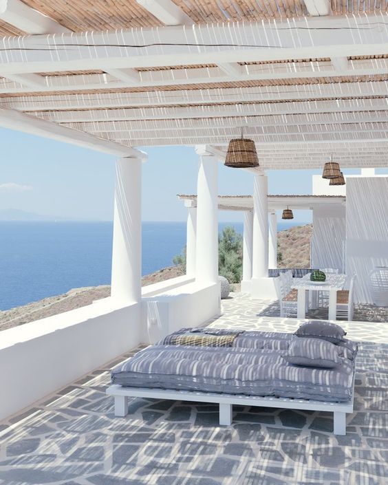 terrace overlooking the sea furnished in a minimal style