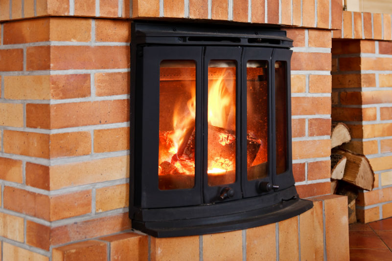 recover-fireplace-by-inserting-stove-3