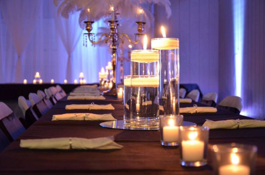 Compose the centerpiece with candles