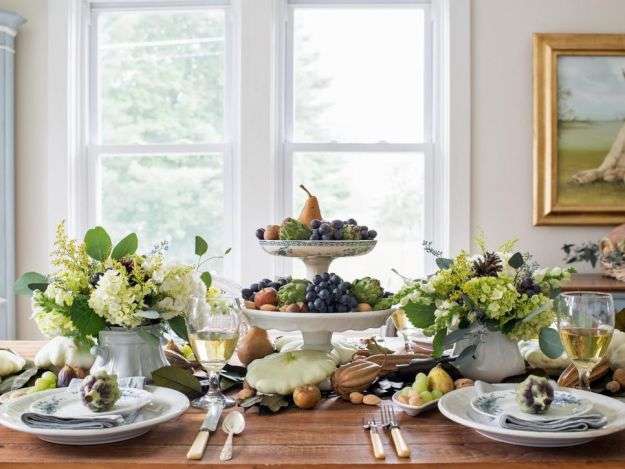 Autumn table with fruit and flowers