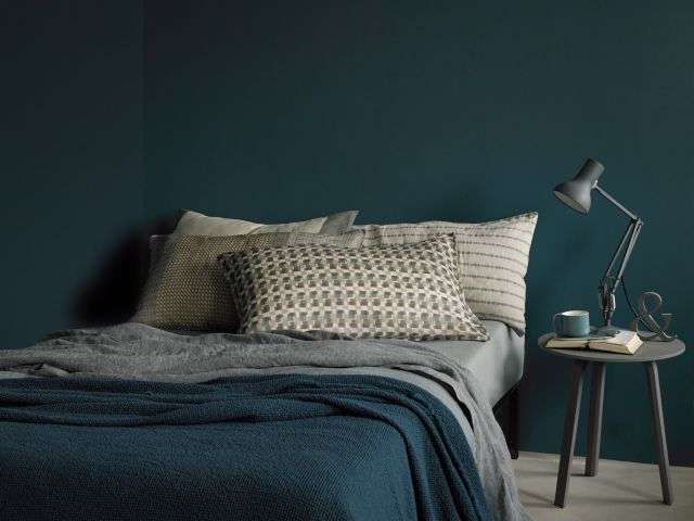 decorate the bedroom with petrol green and gray