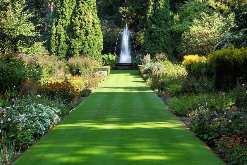 manicured lawn and flower beds