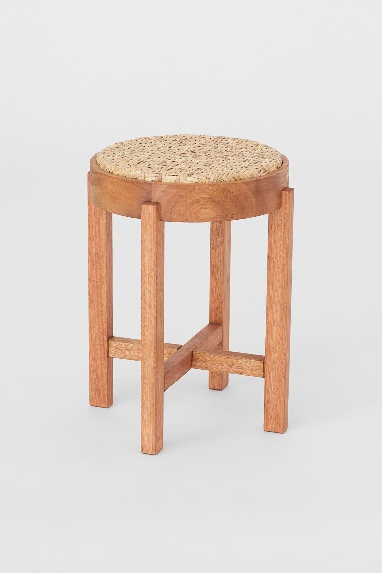 Round stool in eucalyptus wood with braided rattan seat