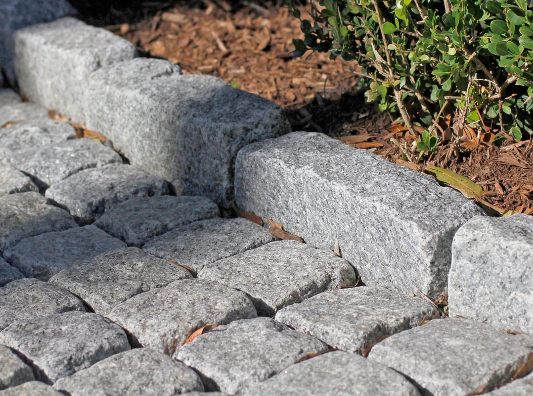 How do you lay a stone border?