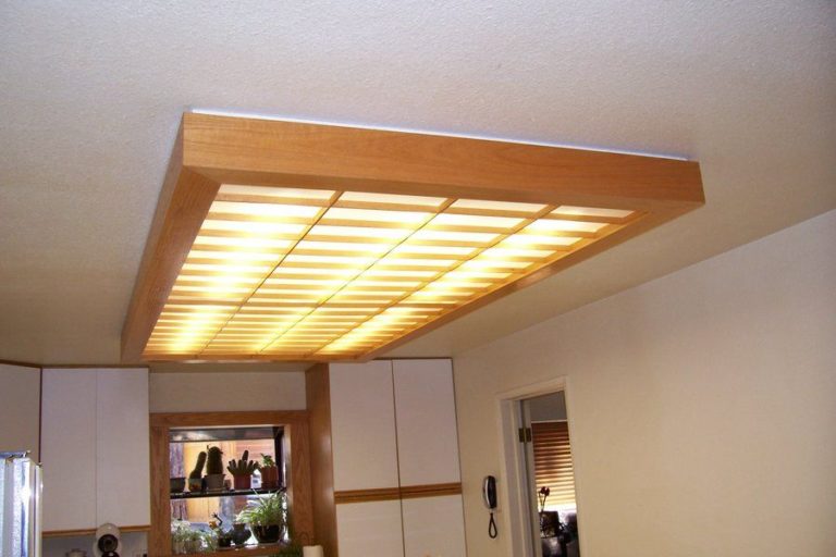 hanging fluorescent kitchen light fixture with frosted glass